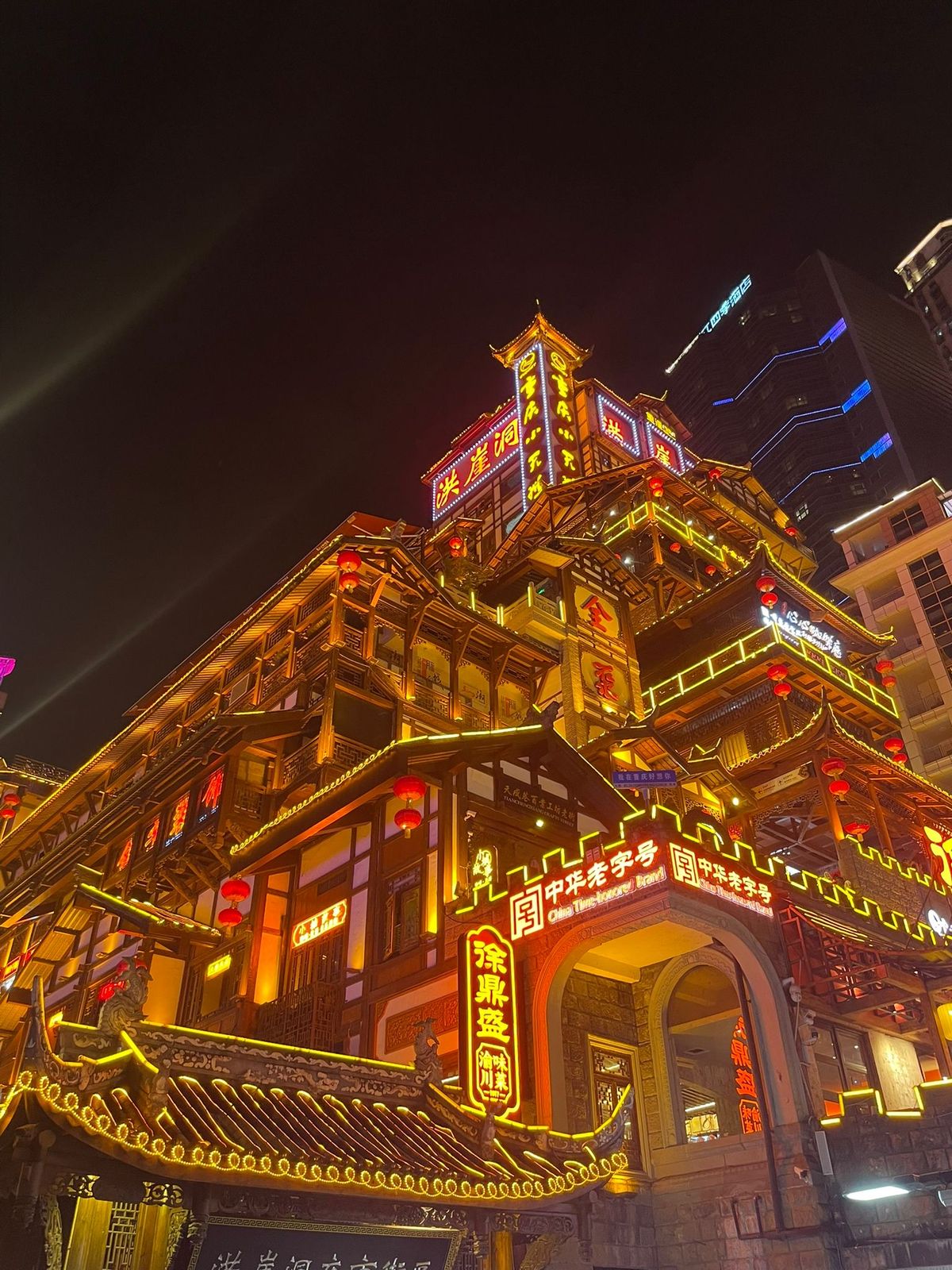 Hongya Cave lit up at night, Chongqing