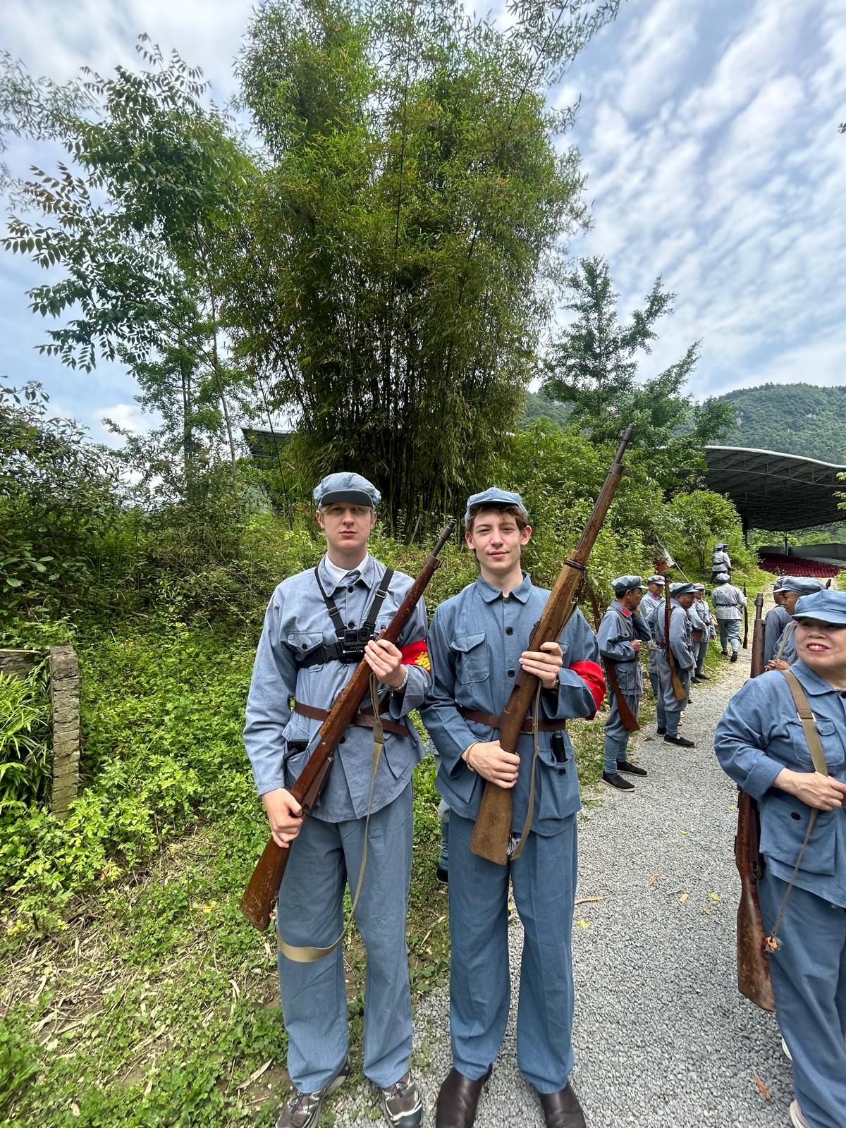 Red Army uniforms and prop rifles at the Loushan Pass reenactment